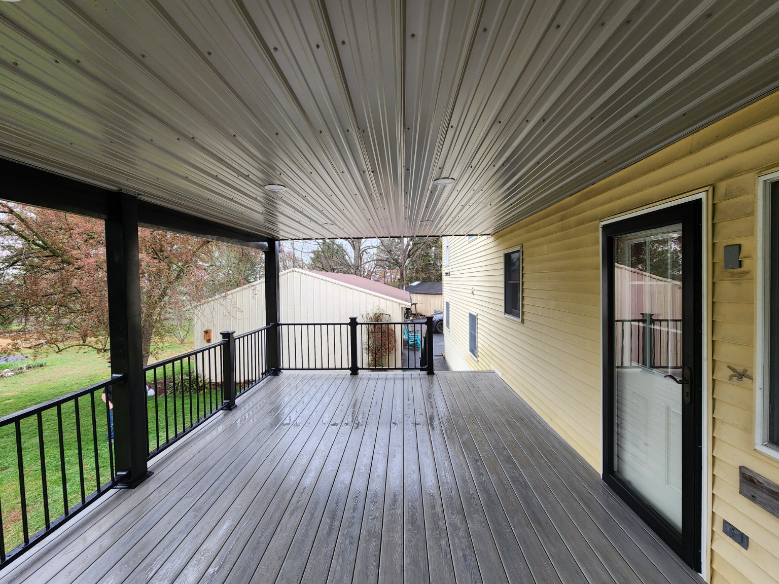 Additional view of the covered porch and finished ceiling